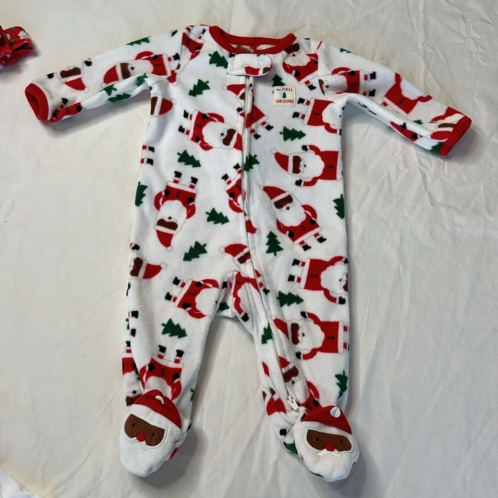 Carter’s baby girl Christmas bundle. One pair of fleece footed pajamas, one tutu